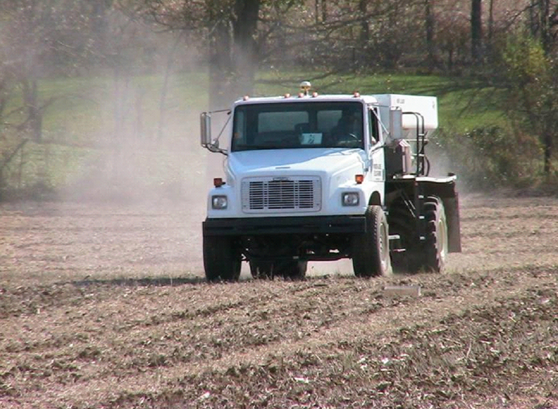 Truck driving through soil